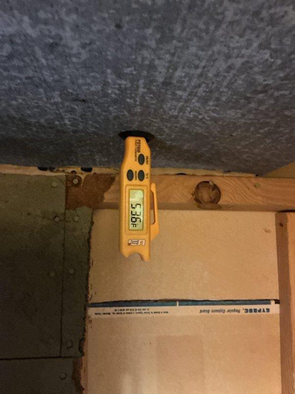 Completed scheduled cooling maintenance visit on residential HVAC system. Performed temperature diagnostics in conditioned space, recording 93°F ambient reading in basement area. Conducted electrical measurements and system performance verification at outdoor condensing unit, checking voltage and amperage readings to ensure proper compressor operation and confirm system is running within manufacturer specifications.