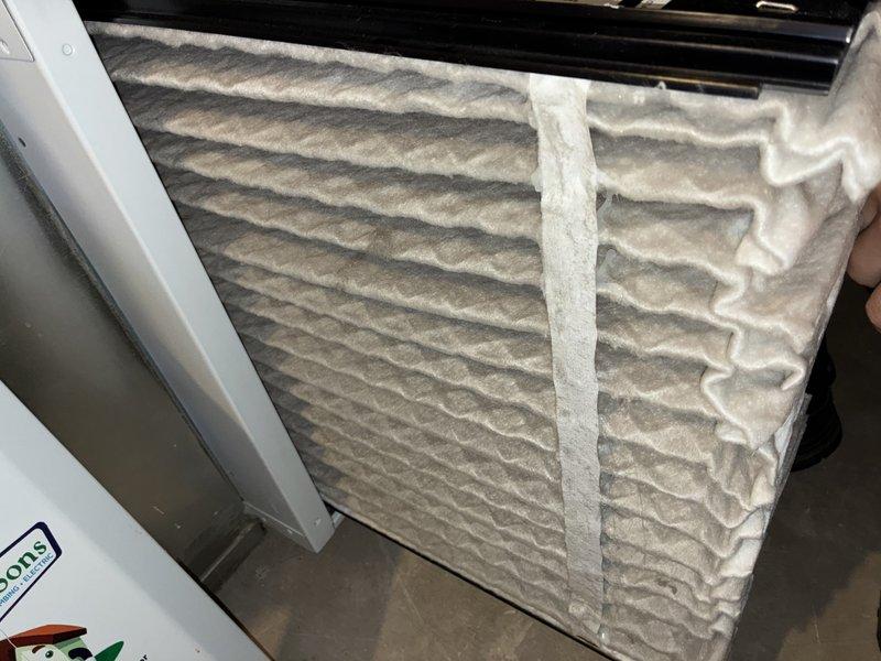 Completed scheduled MVP cooling maintenance visit. Inspected and evaluated air filter condition, finding moderate dust accumulation on pleated media but filter still serviceable. Performed exterior inspection of condenser unit, verifying proper placement on pad, clear airflow through louvers, and adequate clearance from building structure and surrounding landscaping.