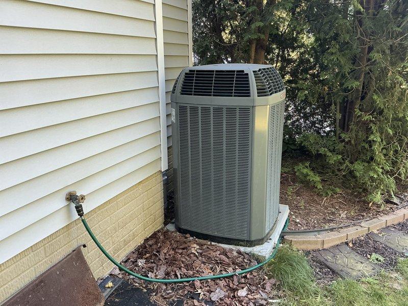 Completed estimate for furnace and air conditioning system replacement on 17-year-old equipment with cracked heat exchanger. Assessed existing Trane outdoor condensing unit and indoor furnace system, documented equipment condition and confirmed heat exchanger failure requiring full system replacement. Provided comprehensive replacement options and recommendations for new HVAC system installation.