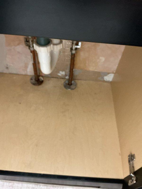 Responded to a service call for a first-floor bathroom sink requiring shut-off valve replacement. Successfully installed two new shut-off valves on the hot and cold water supply lines beneath the vanity, restoring proper water control functionality to the fixture. The existing copper supply lines and PVC drain assembly were inspected and confirmed to be in working order upon completion.