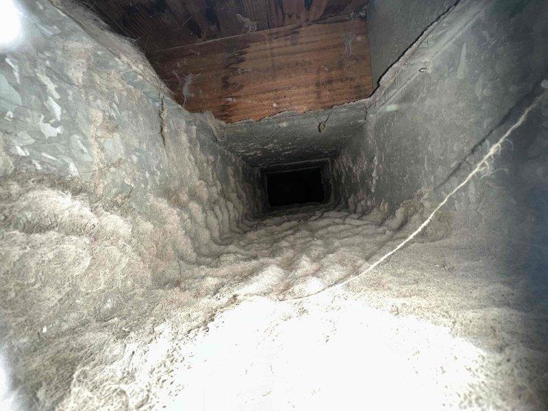 Performed comprehensive duct cleaning service for residential HVAC system. Pre-inspection revealed significant accumulation of dust, lint, and particulate matter throughout the ductwork, with heavy buildup on metal surfaces and bottom channels. Completed thorough cleaning of all accessible duct sections, removing accumulated debris and restoring proper airflow capacity throughout the ventilation system.