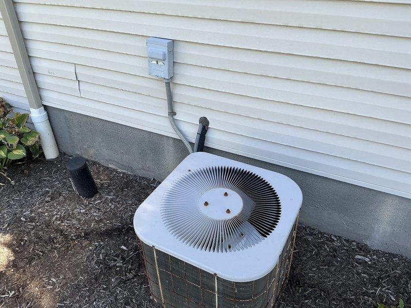 Completed estimate for replacement of 25-year-old residential air conditioning system. Unit was found to be low on R22 refrigerant with leaking motors. Due to the age of the equipment and the phase-out of R22 refrigerant, replacement was quoted rather than repair. Customer to confirm decision on proceeding with new system installation.