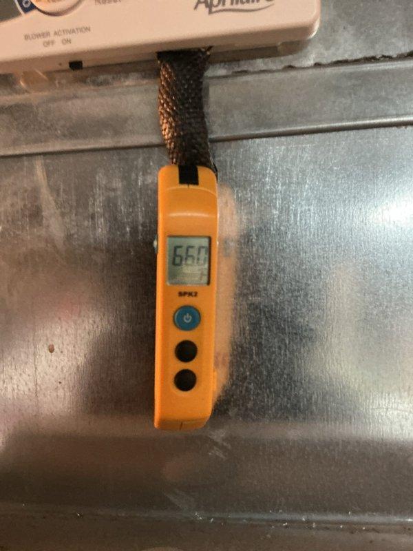 Performed comprehensive tune-up on 12-year-old air conditioning system with no reported issues. Inspected outdoor unit, tested system performance with digital gauges reading 660 PSI, and documented severely clogged air filter requiring immediate replacement due to heavy dust and debris accumulation restricting airflow. Replaced dirty filter, verified proper blower activation on Aprilaire humidifier control, checked refrigerant levels, and confirmed all system components operating within normal parameters.