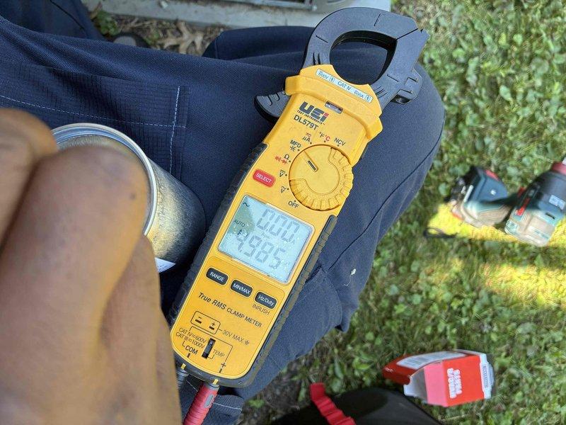 Performed comprehensive air conditioning tune-up and maintenance on a ten-year-old cooling system. Inspected refrigerant lines, connections, and filter drier assembly for proper operation and potential leaks. Utilized digital clamp meter to verify electrical measurements and system performance, confirming all components operating within manufacturer specifications.
