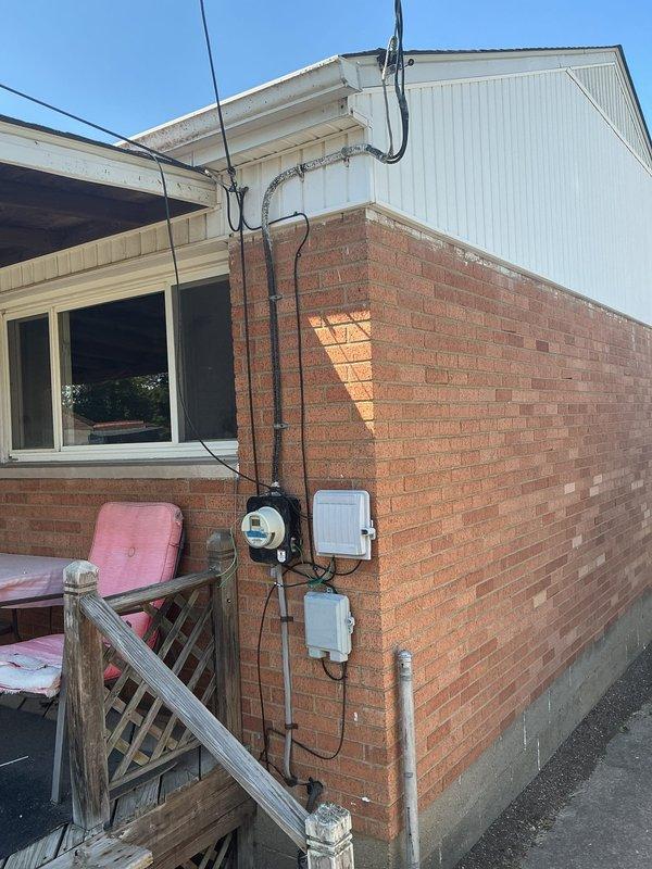 Installed dedicated electrical circuit for hot water tank including new breaker installation in existing electrical panel. Ran conduit and wiring from basement panel to exterior meter location, completing all connections per code requirements. Verified proper circuit operation and ensured all electrical components were properly secured and labeled.