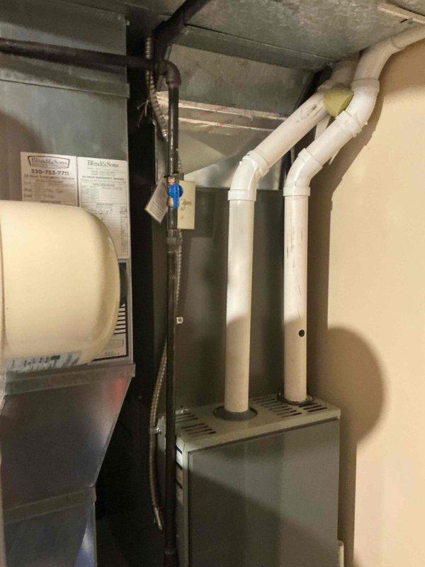 Performed scheduled maintenance tune-up on a two-year-old Lennox EL16XC1 air conditioning system. Completed comprehensive inspection of outdoor condenser unit and indoor furnace components, verified electrical connections and voltage specifications, checked refrigerant levels and pressures, inspected ductwork and ventilation systems, and confirmed all safety labels and warnings were intact. Unit operating within normal parameters with no issues identified.