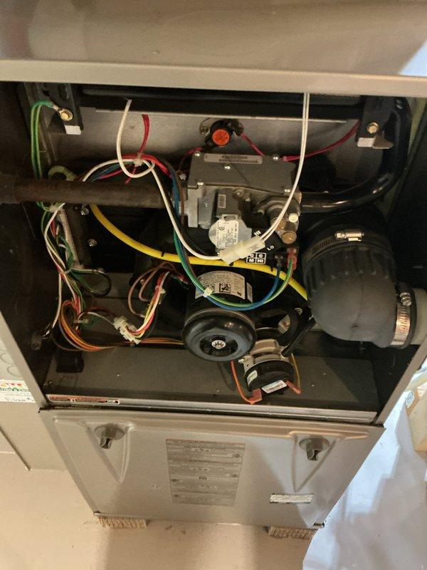 Completed MVP recurring cooling maintenance visit on residential HVAC system. Performed comprehensive inspection of indoor furnace/air handler unit, examining blower motor assembly, gas valve controls, electrical connections, and wiring harnesses for proper operation and safety. Inspected outdoor condensing unit including fan operation, condenser coils, and refrigerant lines. Documented system condition with photos showing all major components functioning properly. Unit rescheduled from previous date and successfully serviced with no issues identified requiring immediate repair.