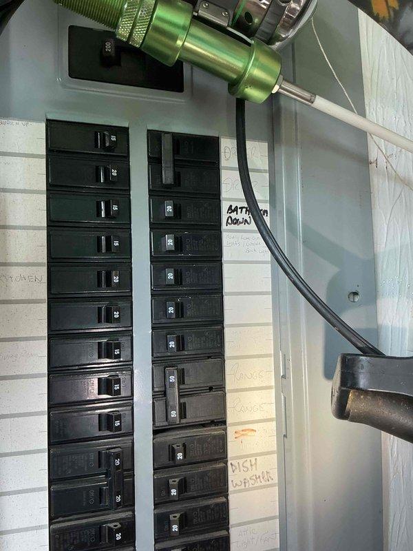 Conducted on-site evaluation for whole-house standby generator installation. Assessed existing electrical service panel to determine compatibility and required modifications for generator integration. Panel inspection revealed 200-amp main service with adequate breaker capacity and proper circuit identification for essential loads. Documented current electrical configuration including HVAC systems, garage circuits, and critical household loads to establish transfer switch requirements. Photographed electrical panel layout and circuit distribution for accurate material estimation and permit preparation. Provided homeowner with recommendations for generator sizing based on existing electrical demand and discussed placement options for outdoor generator unit and automatic transfer switch installation.