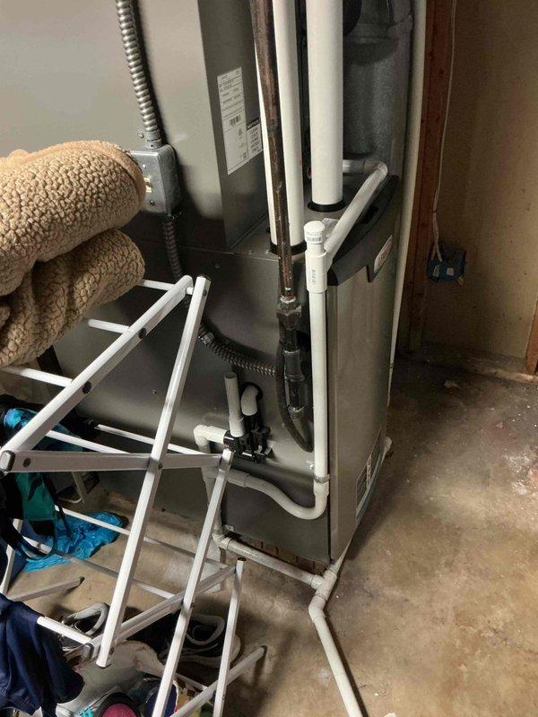 Completed preventive maintenance inspection on 5-year-old Lennox air conditioning system for MVP customer. Performed comprehensive evaluation of indoor furnace unit and outdoor condenser, verified proper operation of all components, checked refrigerant line connections, and documented equipment condition with photos. System found operating within normal parameters with no immediate service needs identified.