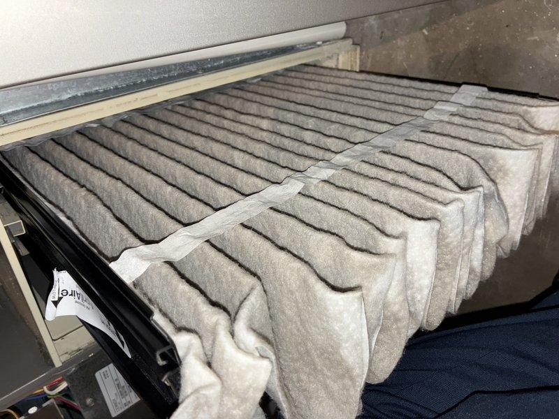 Completed preventative maintenance on 7-year-old air conditioning system as part of recurring MVP cooling service. Inspected blower wheel assembly and squirrel cage fan, confirming proper operation and cleanliness of internal components. Examined air filter which showed moderate dust accumulation; filter pleats maintained structural integrity and remained functional within acceptable service parameters.