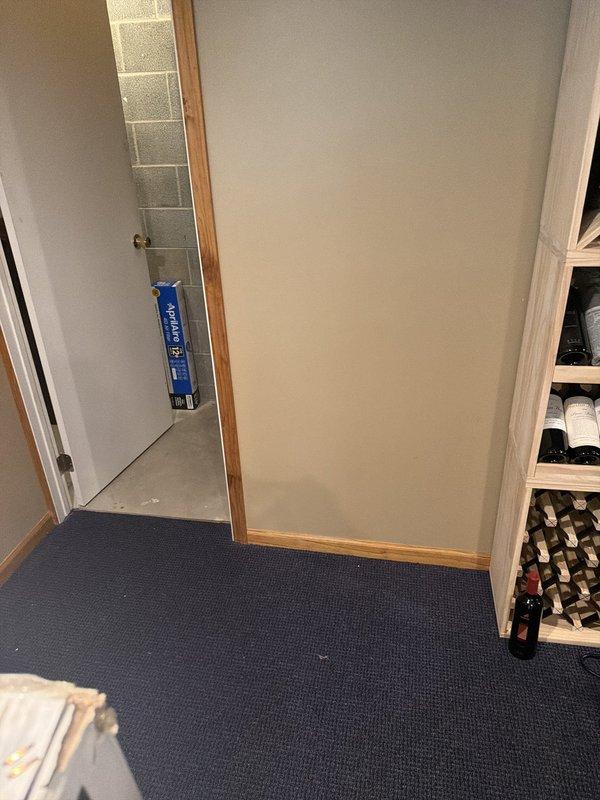Installed dedicated 20-amp circuit for refrigerator in basement area. Ran new wiring from electrical panel to outlet location, installed outlet box and receptacle in accordance with NEC requirements for kitchen appliance circuits.