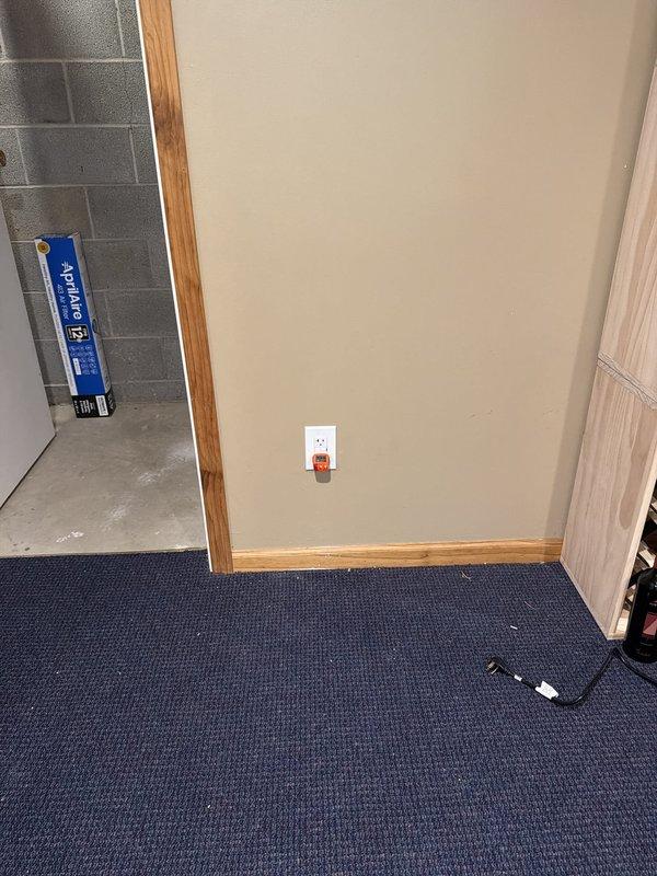 Installed dedicated 20-amp circuit for refrigerator in basement area. Ran new wiring from electrical panel to outlet location, installed outlet box and receptacle in accordance with NEC requirements for kitchen appliance circuits.
