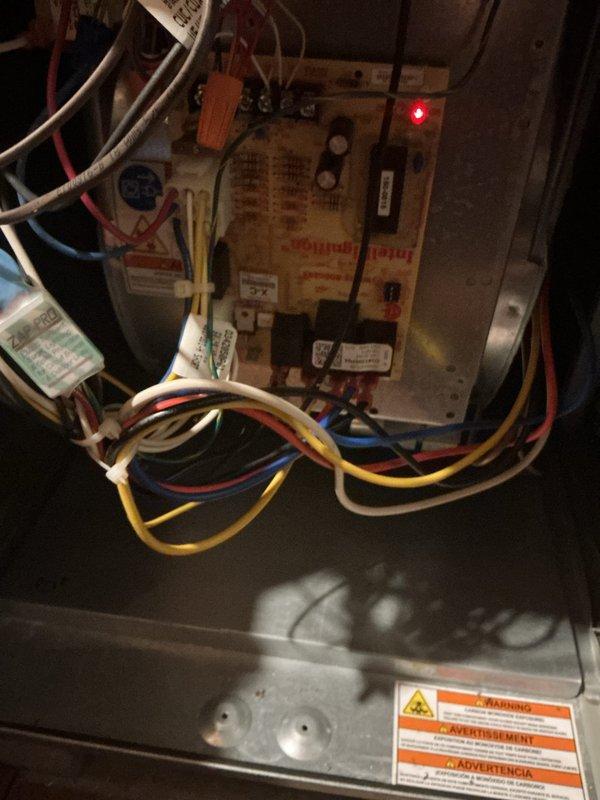 Completed annual maintenance on 11-year-old air conditioning system, which included inspection of indoor furnace control board and outdoor condenser unit. Verified all electrical connections, checked control board operation with LED indicators functioning properly, inspected condenser fan assembly and guard for proper operation, and confirmed unit is operating within normal parameters.