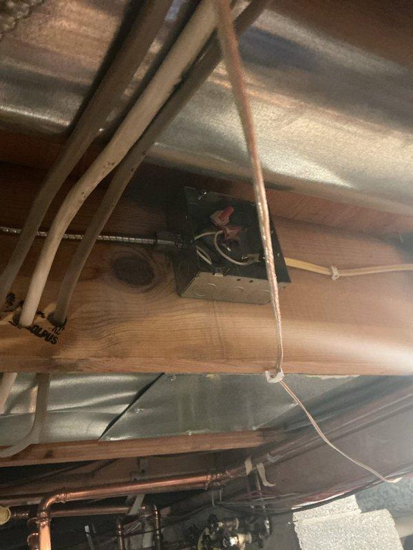 Installed dedicated electrical circuits for two tankless water heaters in accordance with manufacturer specifications and local electrical code requirements. Routed electrical conduit and wiring through attic space and down to mechanical room location, securing all runs to structural members and maintaining proper clearances from HVAC ductwork and plumbing lines. Completed power wiring installation (PWI) with appropriate wire gauge for tankless unit amperage demands, verified proper grounding, and ensured all connections meet safety standards for high-draw appliances.