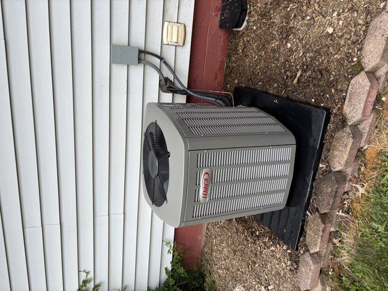 Completed routine cooling maintenance visit on Lennox air conditioning system. Performed comprehensive inspection of outdoor condenser unit and indoor air handler, checking refrigerant lines, electrical connections, and drainage components. Utilized digital testing equipment to verify system performance parameters, confirmed proper operation of all components, and documented equipment condition with photographic records.
