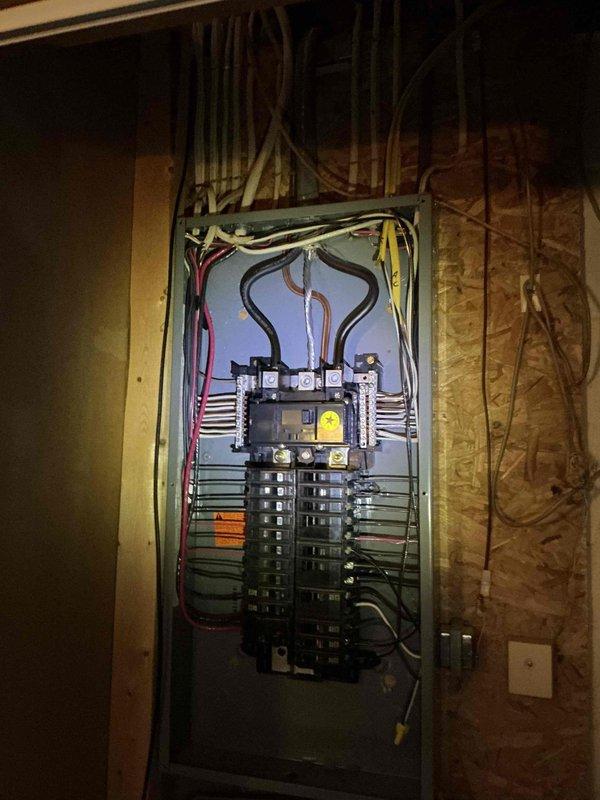 Conducted on-site evaluation for backup generator installation, comparing Kohler and Generac systems for residential application. Assessed existing electrical panel configuration, service capacity, and optimal transfer switch placement in unfinished utility area with exposed framing. Documented current electrical infrastructure including main breaker panel, service conductors, and circuit distribution to determine load requirements and integration specifications for automatic standby generator system.
