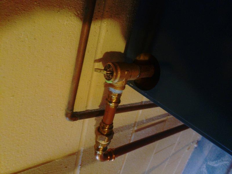 Successfully replaced all three zone valves on the boiler heating system with new Taco zone valves, maintaining the existing wiring configuration. Removed the old corroded zone valves from the copper manifold system and installed new units with proper electrical connections to ensure independent zone control. Additionally, replaced the failing Extrol expansion tank to restore proper system pressurization and prevent future operational issues. All copper connections were properly soldered, tested for leaks, and verified for proper operation. System was pressurized, purged of air, and each zone was individually tested to confirm proper valve operation and flow control.