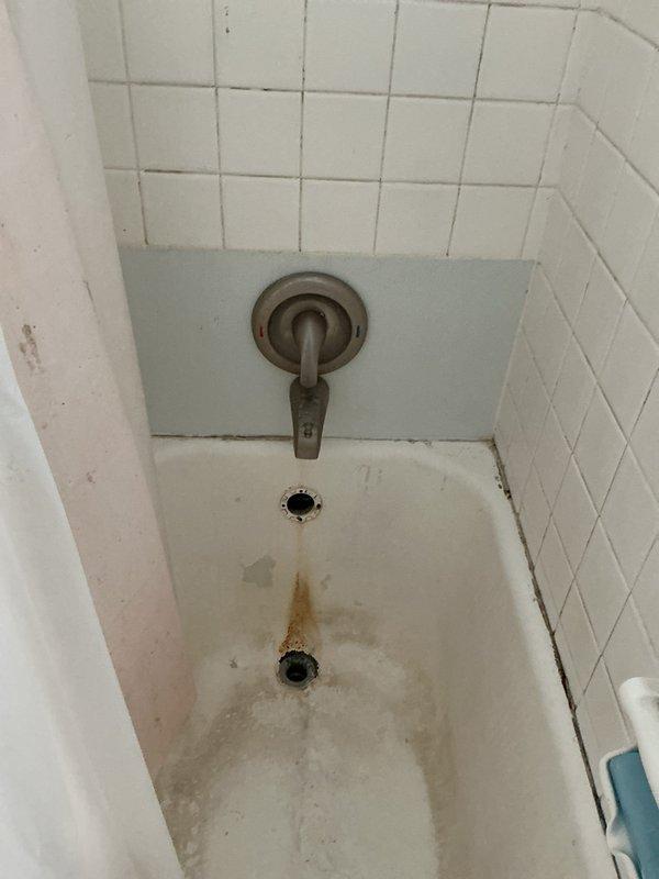 Responded to a toilet obstruction caused by a suspected hard plastic object lodged in the drain line. After assessment, removed the toilet from the floor flange and successfully extracted the foreign object using specialized retrieval tools, as standard augering methods were insufficient to clear the blockage. Reinstalled toilet with new wax ring and verified proper flush operation and drainage. Additionally addressed a secondary plumbing issue in another bathroom where the sink P-trap assembly was leaking. Replaced the deteriorated 1½" PVC P-trap and tailpiece, including necessary adapters to accommodate older pipe connections at the wall stub-out. Tested all drain connections under pressure to confirm leak-free operation and proper water flow.