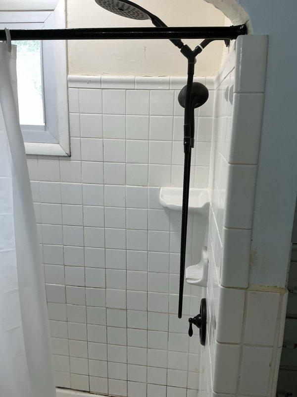 Responded to a toilet obstruction caused by a suspected hard plastic object lodged in the drain line. After assessment, removed the toilet from the floor flange and successfully extracted the foreign object using specialized retrieval tools, as standard augering methods were insufficient to clear the blockage. Reinstalled toilet with new wax ring and verified proper flush operation and drainage. Additionally addressed a secondary plumbing issue in another bathroom where the sink P-trap assembly was leaking. Replaced the deteriorated 1½" PVC P-trap and tailpiece, including necessary adapters to accommodate older pipe connections at the wall stub-out. Tested all drain connections under pressure to confirm leak-free operation and proper water flow.
