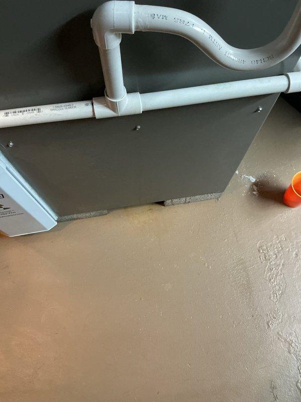 Responded to callback for water accumulation beneath furnace unit. Upon inspection, identified water leaking from PVC condensate drain piping and running down exterior of furnace cabinet. Inspected condensate drain system including pipe connections, elbow joints, and mounting brackets for signs of separation, cracks, or improper pitch that would cause drainage issues and water infiltration onto equipment and floor.