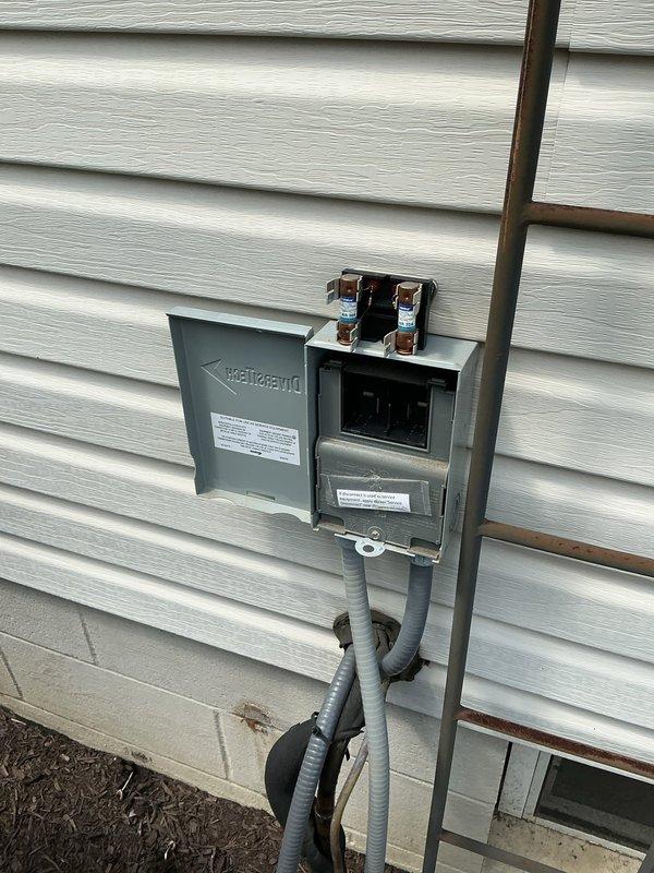 Completed routine AC maintenance on Carrier system. Inspected outdoor disconnect box and electrical connections, verified proper operation of indoor furnace unit, and documented all components functioning within normal parameters. All safety checks passed and system operating efficiently.