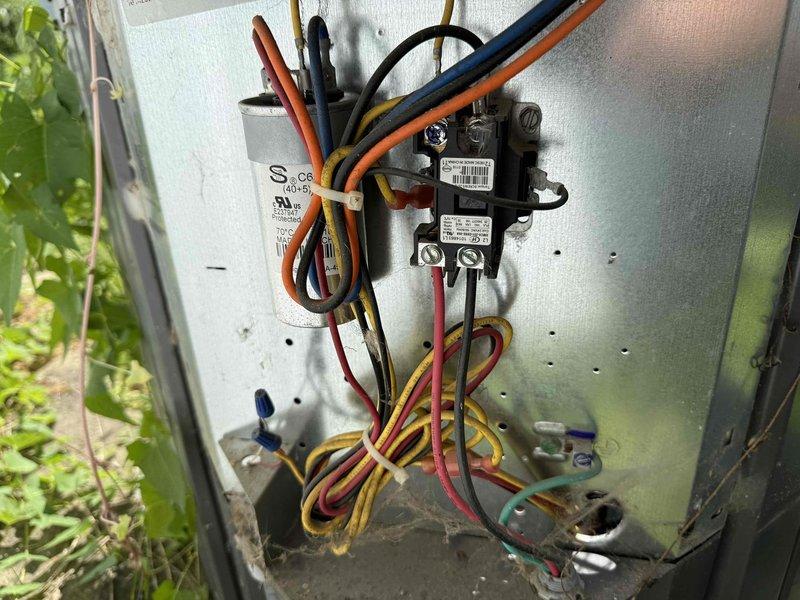 Completed comprehensive AC maintenance on residential cooling system. Performed thorough inspection of indoor furnace control board and outdoor condensing unit electrical components, verifying all connections, contactors, relays, and capacitors were secure and functioning properly. All electrical wiring, terminals, and control circuits tested and found to be in good operating condition with no signs of damage or deterioration requiring immediate attention.