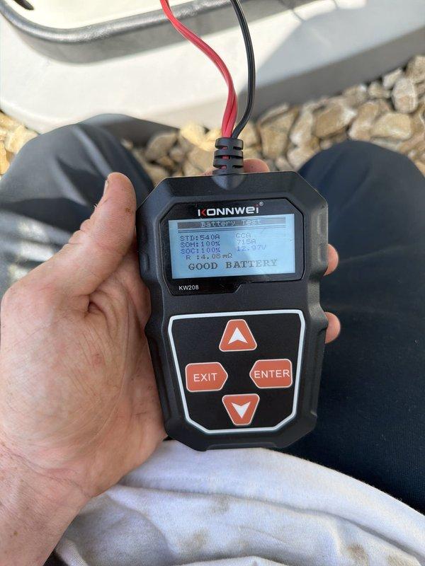 Completed annual preventive maintenance on residential Generac standby generator per manufacturer specifications. Performed comprehensive system inspection including visual examination of unit exterior, verified proper mounting and gravel pad placement, confirmed adequate clearances from structure, and checked for any signs of physical damage or deterioration. Tested battery voltage and condition using electronic battery analyzer, confirming "GOOD BATTERY" status with acceptable voltage levels. Inspected all external components including housing integrity, ventilation louvers for obstructions, and verified operational status indicators displaying proper green light illumination. Unit found to be in excellent operating condition with no issues identified. Generator is functioning properly and ready for automatic operation when required.