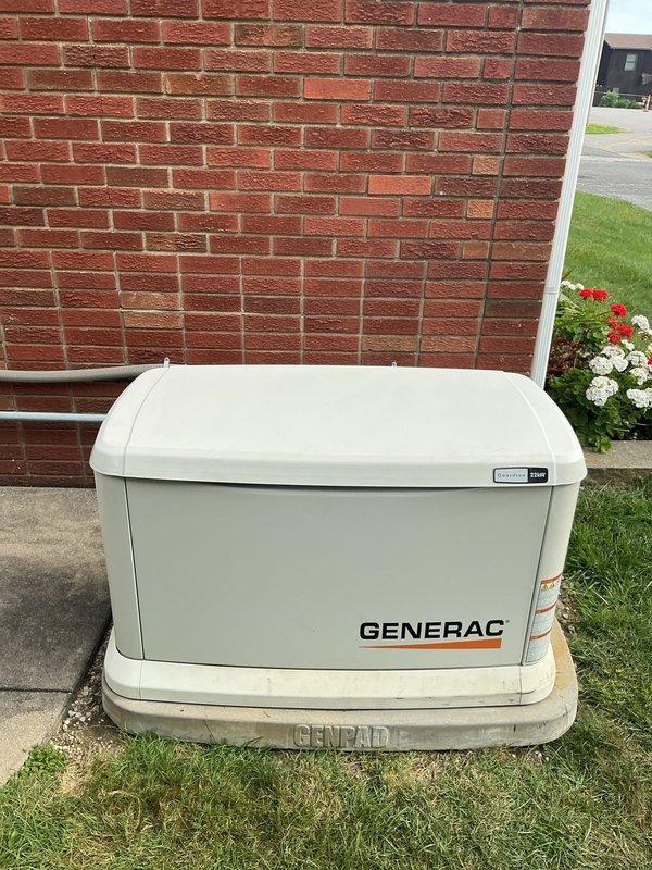 Responded to service call for Generac standby generator continuously running without power outage. Diagnostic evaluation revealed blown N1 and N2 fuses in control panel. Inspection identified corroded battery terminals requiring replacement and maintenance battery at end of service life. Generator unit covered under 10-year comprehensive warranty with annual maintenance requirement, including Generator Value Plan (GVP) coverage for remaining five years encompassing scheduled maintenance, battery replacements, transfer switch repairs, and generator component repairs. Documented findings and confirmed battery and terminal replacement needed under GVP coverage. Photographed generator installation on concrete pad and internal components with access panel open. Service scheduled for 8am to complete necessary repairs.