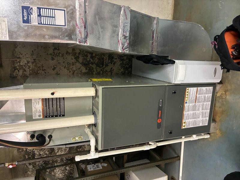 Completed MVP cooling maintenance visit on 10-year-old HVAC system. Performed comprehensive inspection of air handler unit, control board, and electrical components. Verified proper operation of all system controls, checked wiring connections, and inspected ductwork connections and sealing. Documented equipment condition with photographs showing internal components including circuit board, capacitors, and wiring harness in standard operational condition. System operating within normal parameters.