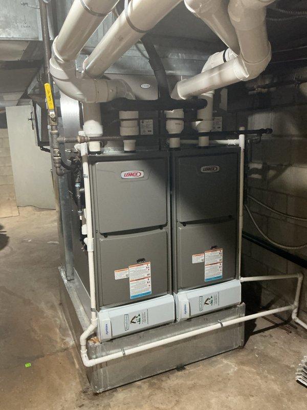 Responded to no cooling complaint on downstairs unit. Upon inspection, found evaporator coil heavily contaminated with debris, dust, and organic matter buildup, severely restricting airflow and heat transfer. Measured temperatures confirmed inadequate system performance due to dirty coil condition. Advised customer that approximately 10-year-old Lennox system requires thorough coil cleaning and full system evaluation to restore proper cooling operation.