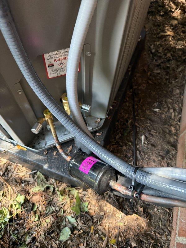 Completed full HVAC system installation consisting of an 80% efficiency furnace and air conditioning unit. Installed new outdoor condensing unit with proper refrigerant line connections, electrical disconnect with 30-amp FLNR fuses, and associated copper piping with insulation. All components properly mounted, wired, and tested for optimal system performance.