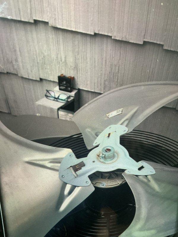 Responded to service call for noisy AC fan operation. Upon inspection, found the condenser fan blade assembly required attention on the Lennox outdoor unit. Removed and inspected the fan blade assembly, which showed signs of wear causing the operational noise. Replaced the defective fan blade component and verified proper clearance and balance. Unit tested successfully with normal operation restored and no abnormal sounds detected.