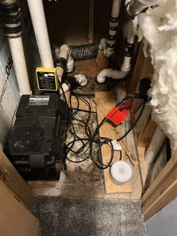 Responded to service call for malfunctioning injector pump experiencing sewer and gas odor issues. Inspected utility closet installation containing dual pump system with associated PVC discharge piping, electrical connections, and ventilation components. Documented existing conditions of pump equipment, wiring configuration, and plumbing connections for assessment and customer consideration of maintenance protection plan options.
