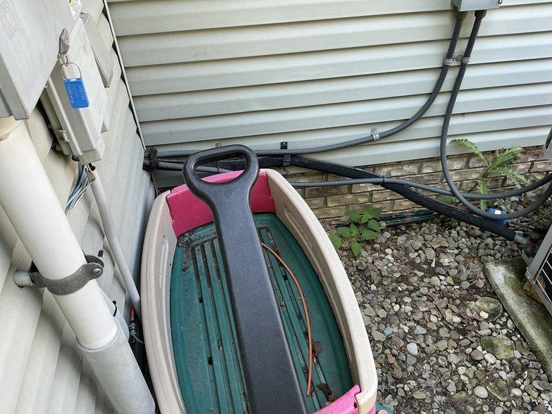 Conducted comprehensive site assessment for furnace and air conditioning system replacement. Evaluated existing Bryant furnace installation in basement mechanical room, documenting current ductwork configuration, plenum connections, and overall HVAC infrastructure condition. Inspected exterior condensing unit location and surrounding utility area, noting drainage conditions and clearance requirements for new equipment installation.