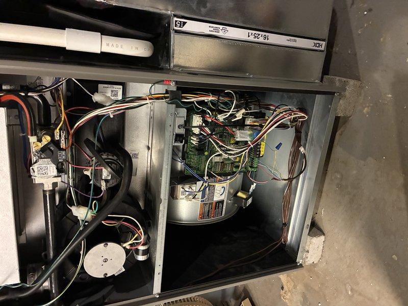Completed BS-MVP cooling maintenance visit on 2-year-old air conditioning system. Performed comprehensive inspection of indoor air handler unit, verifying proper operation of blower motor assembly, electrical connections, and control boards. Inspected outdoor condensing unit positioned on deck, checking refrigerant coils, electrical conduit connections, and overall system operation. All components found in good working condition with no immediate service needs identified. Unit confirmed operational and ready for continued cooling season performance.