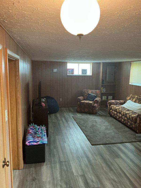Installed electrical wiring and power supply for six ceiling-mounted light and fan combination fixtures throughout the residence, including hallway and basement living areas. Ran new electrical lines, made necessary connections, and ensured all fixtures were properly powered and operational per code requirements.