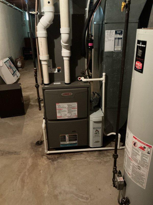 Responded to cooling deficiency complaint on 6-year-old Lennox system. Performed diagnostic evaluation of indoor air handler and outdoor condensing unit. Connected refrigerant manifold gauges to assess system pressures and charging levels. Inspected basement-mounted furnace and air handler assembly along with outdoor unit for proper operation. System found operational but underperforming on cooling capacity, likely requiring refrigerant charge adjustment or additional diagnostics to restore optimal performance.