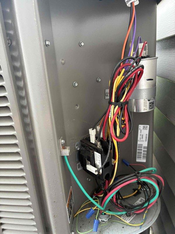 Completed annual maintenance tune-up on one-year-old air conditioning system. Inspected electrical components including contactor, capacitor, and control wiring; verified proper connections and secure wire routing. Evaluated blower wheel assembly for cleanliness and operational condition, noting minor dust accumulation typical of normal operation.
