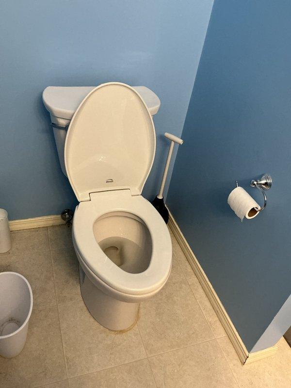 Responded to service call for reported toilet leak. Upon inspection, identified active water pooling on bathroom floor tiles near base of toilet fixture. Diagnosed leak source, performed necessary repairs to eliminate water seepage, and verified proper seal integrity. Toilet restored to normal operation with no further leakage detected upon completion of work.