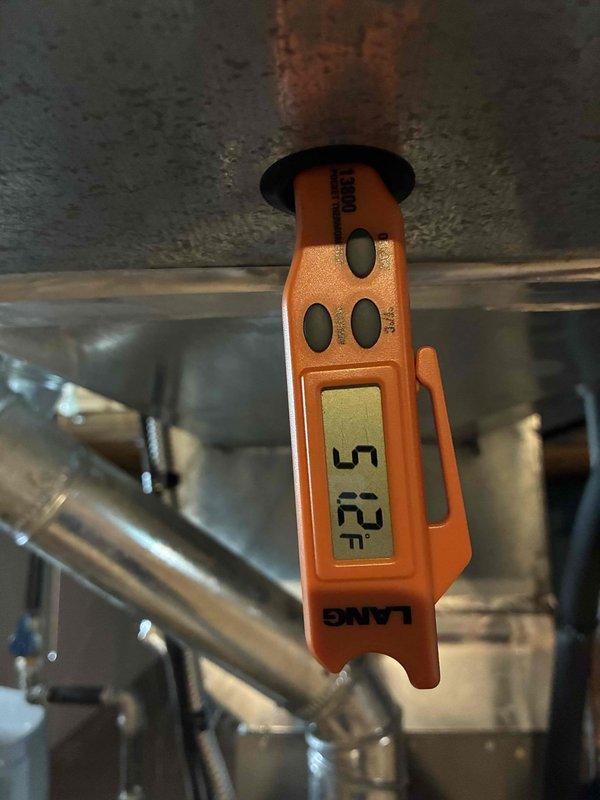 Completed scheduled cooling maintenance visit from 2023. Performed system diagnostics and temperature measurements, recording supply air temperature at 51.5°F. Inspected outdoor condensing unit, verified electrical connections, capacitor condition, and overall system operation to ensure proper cooling performance.