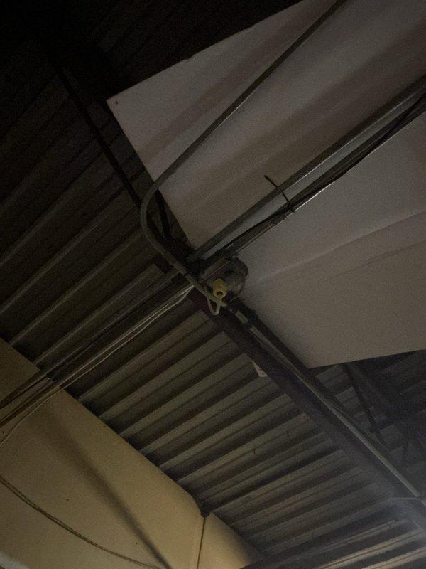 Responded to no power condition in back room area. Upon arrival, investigated electrical distribution system and traced affected circuits. Inspected main electrical panel and identified issue with circuit breaker supplying power to back room. Found tripped breaker due to overload condition on circuit. Reset breaker and verified power restoration to all affected areas. Tested outlets and confirmed proper voltage and functionality throughout back room. Inspected electrical panel wiring connections and conduit runs for any signs of damage or deterioration. All connections found secure with no visible defects. Advised customer that circuit may have experienced temporary overload and to monitor for recurring issues. Recommended load evaluation if problem persists.