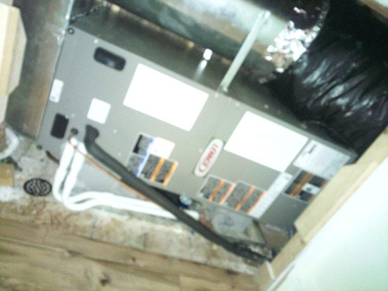 Completed full HVAC system installation including new air handler unit and outdoor AC condenser. Installed air handler on wooden platform in attic space with proper ductwork connections, mounted unit securely with all required electrical components including 20-amp fuses and disconnect switch. System tested and verified operational upon completion.