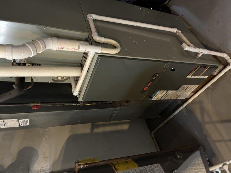 Responded to service call for 13-15 year old Panasonic mini split system with inadequate airflow and cooling issues. Upon inspection of the indoor head unit located in semi-finished attic space, found evaporator coil heavily contaminated with dirt, dust, and biological growth, causing significant airflow restriction. Cleaned evaporator coil, removed debris buildup from blower wheel and housing, and verified proper fan operation and airflow restoration upon completion.