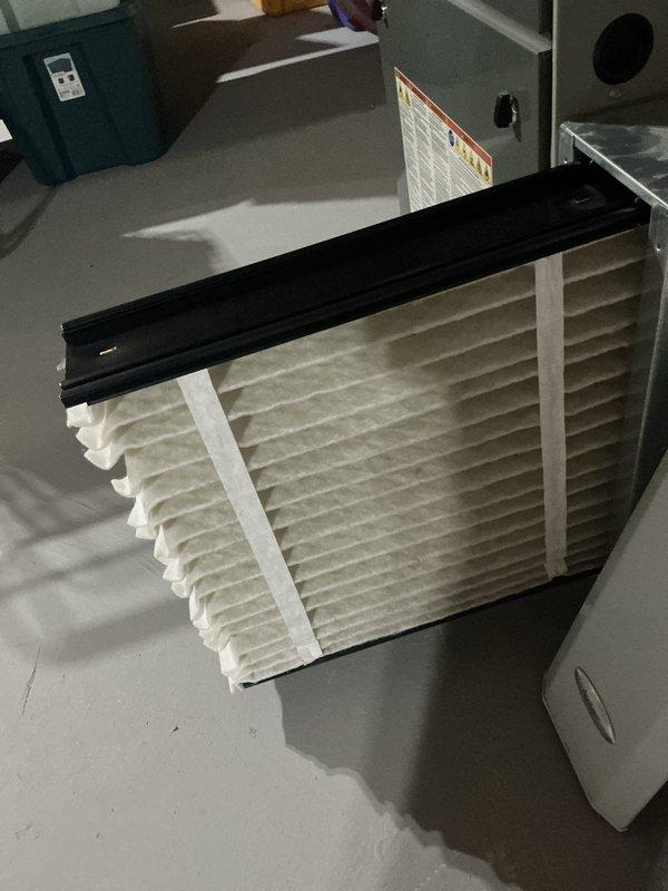 Completed preventive maintenance on a 5-year-old residential air conditioning system as part of MVP recurring service program. Performed condenser cabinet cleaning and water wash of outdoor coil to remove significant accumulation of dirt, debris, and grime that was restricting airflow through the condenser fins. Inspected indoor air filter unit, which showed moderate dust accumulation but remained serviceable.