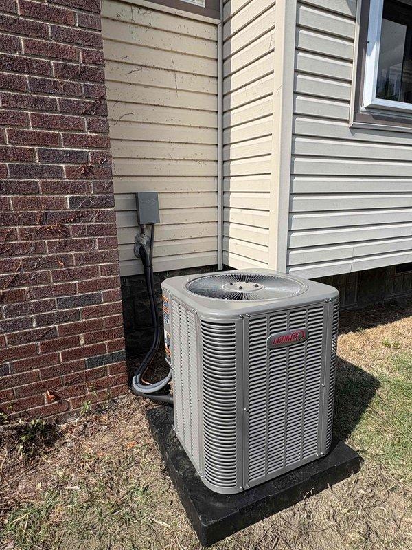 Completed installation of residential air conditioning system and evaporator coil. Installed new outdoor condensing unit on composite base pad with proper clearance from structure, connected electrical disconnect with FLNR 20-amp fuses and appropriate wiring, and verified all electrical connections meet code requirements. System tested and operational upon completion.