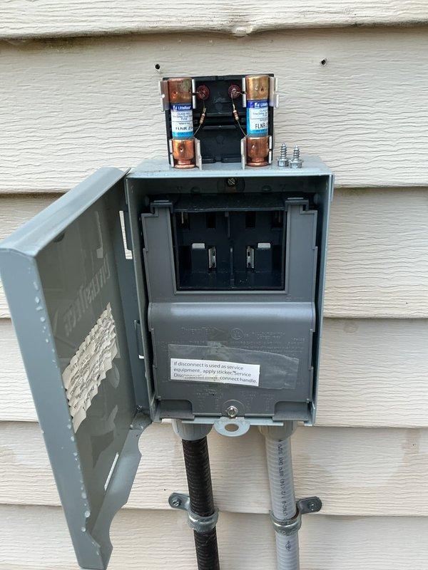 Completed preventative maintenance inspection on one-year-old outdoor air conditioning system. Accessed electrical compartment and inspected all internal components including capacitor, control board, wiring connections, and grounding system. Verified proper operation of outdoor disconnect box and fuse assembly. All electrical connections found secure, capacitor tested within normal parameters, and system components operating as designed. Unit confirmed ready for cooling season.