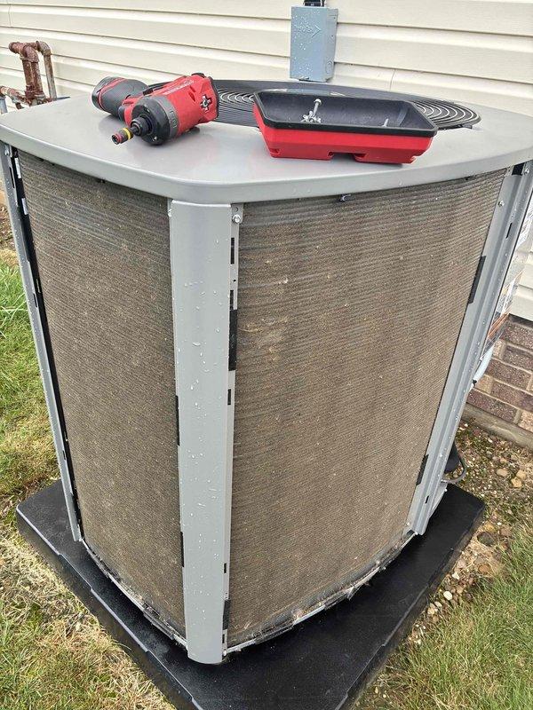 Completed MVP annual air conditioning maintenance on residential outdoor condensing unit approximately two years old. Performed comprehensive system inspection including visual examination of cabinet panels, protective screening, and refrigerant line connections. Verified proper unit placement on isolation pad and confirmed electrical disconnect box accessibility. Checked condensate drainage system and placed overflow pan for monitoring. All components found to be in serviceable condition with screening material intact and unit operating within normal parameters. Discussed service agreement renewal options and clarified warranty coverage details with homeowner.