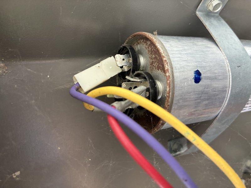 Responded to no cooling complaint on 5-year-old air conditioning system. Upon inspection, discovered blower motor showing signs of corrosion and potential failure at connection points. Verified air filter condition and performed diagnostic assessment of unit components to determine root cause of cooling issue.