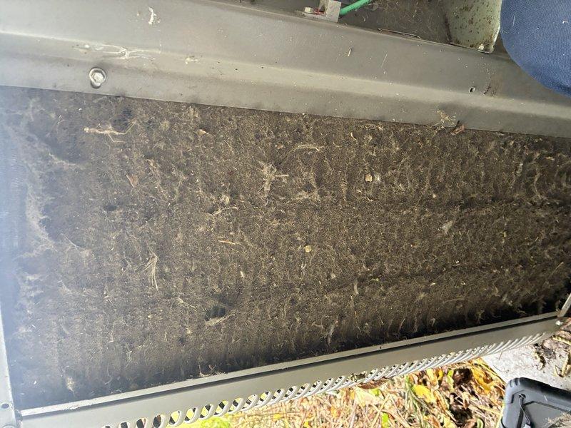 Responded to no cooling complaint on 6-year-old Lennox central air conditioning system. Upon inspection, discovered severely clogged air filter with heavy accumulation of dust, dirt, lint, and debris restricting airflow to the system. Removed and replaced dirty filter with new filter. Inspected White-Rodgers control board and verified all wiring connections were secure and properly terminated. System tested after filter replacement and confirmed unit now cooling properly with adequate airflow restored.