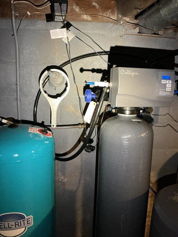Responded to service call for water softener consuming excessive salt while in bypass mode. Upon inspection, diagnosed and addressed malfunction in the Culligan water softening system control valve that was allowing water flow despite bypass setting. Verified proper operation of pressure tank, filtration equipment, and all associated plumbing connections to ensure system functionality was restored and salt consumption returned to normal parameters.
